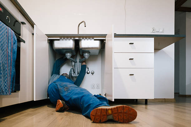 Professional Drain Cleaning technician working in Wauregan, CT